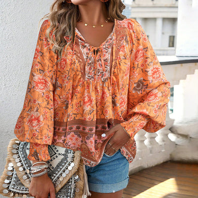 Blusa con lazo en el cuello y estampado floral bohemio