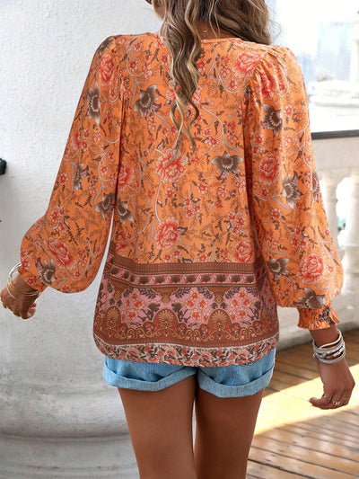 Blusa con lazo en el cuello y estampado floral bohemio