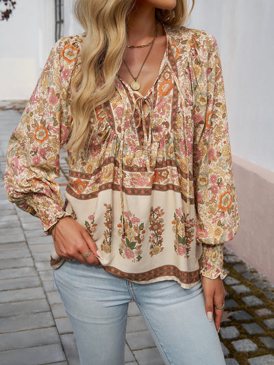 Blusa con lazo en el cuello y estampado floral bohemio