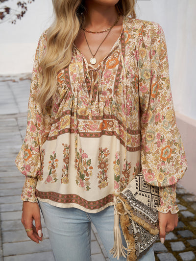 Blusa con lazo en el cuello y estampado floral bohemio