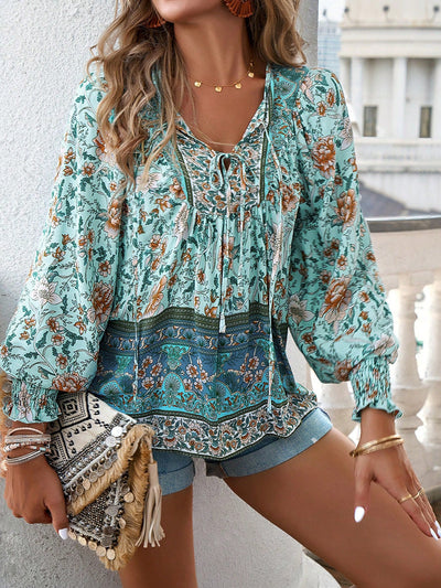 Blusa con lazo en el cuello y estampado floral bohemio