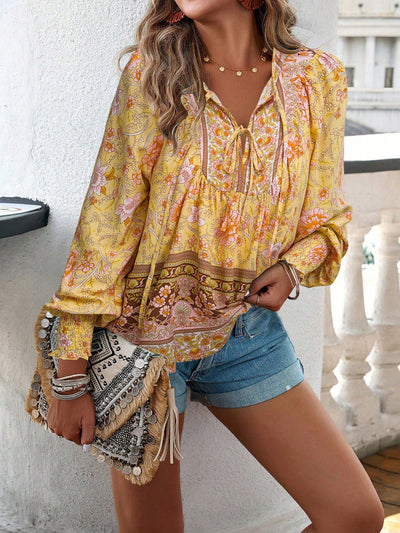 Blusa con lazo en el cuello y estampado floral bohemio