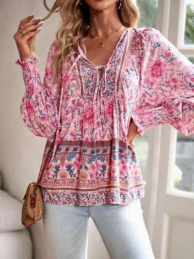 Blusa con lazo en el cuello y estampado floral bohemio