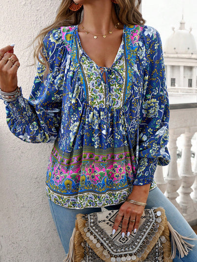 Blusa con lazo en el cuello y estampado floral bohemio