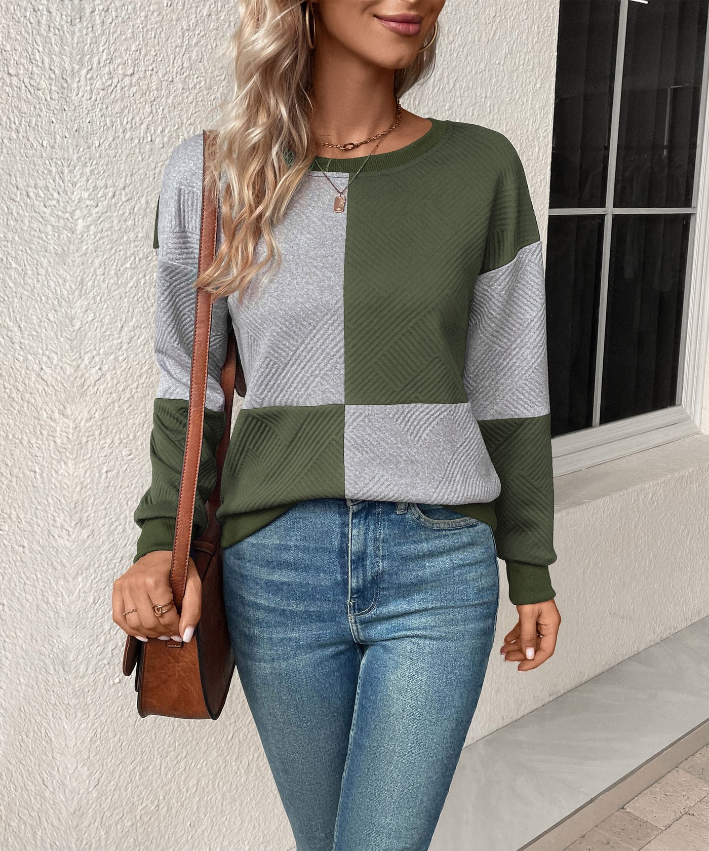 Sudadera texturizada con bloques de color para mujer