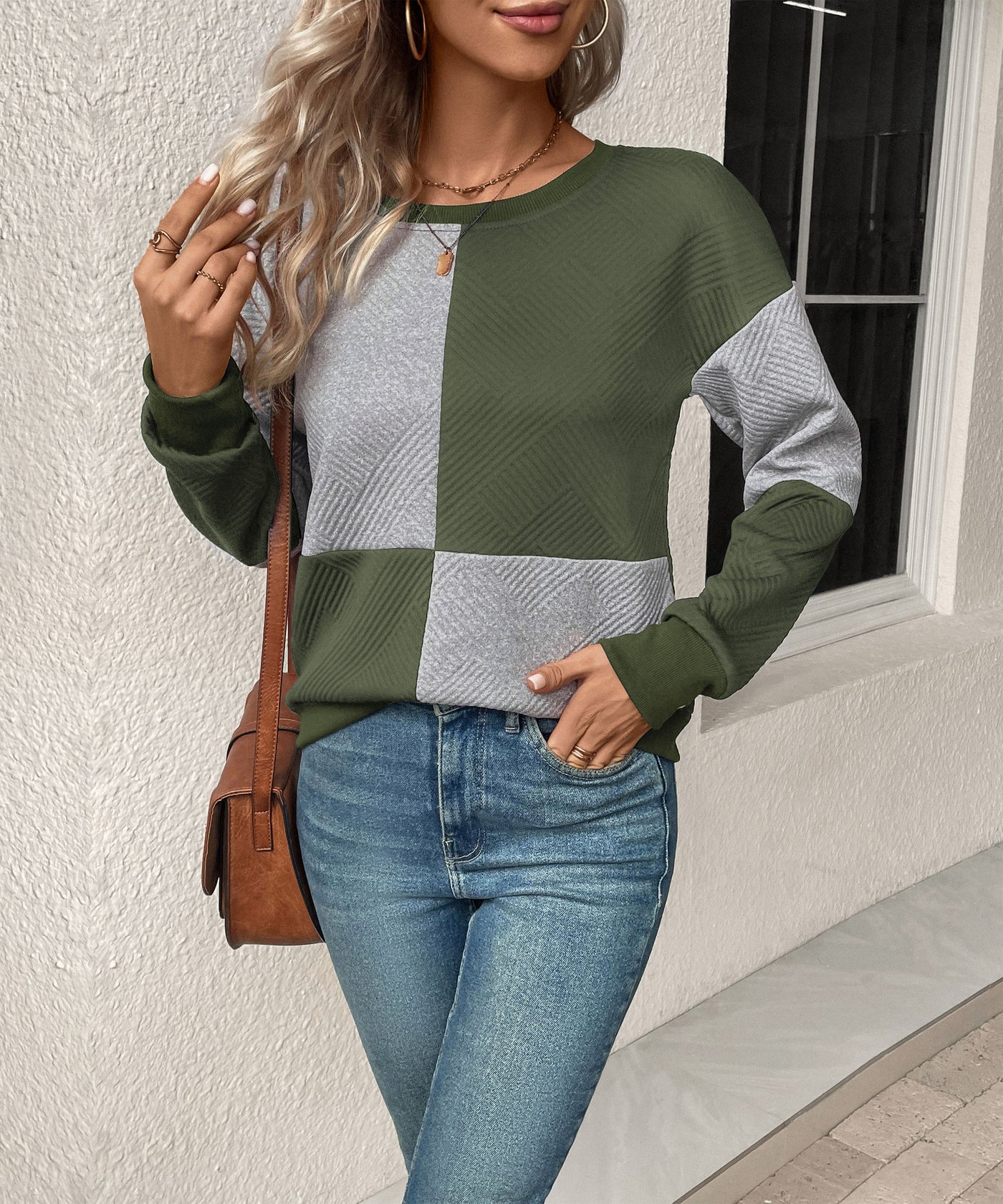 Sudadera texturizada con bloques de color para mujer