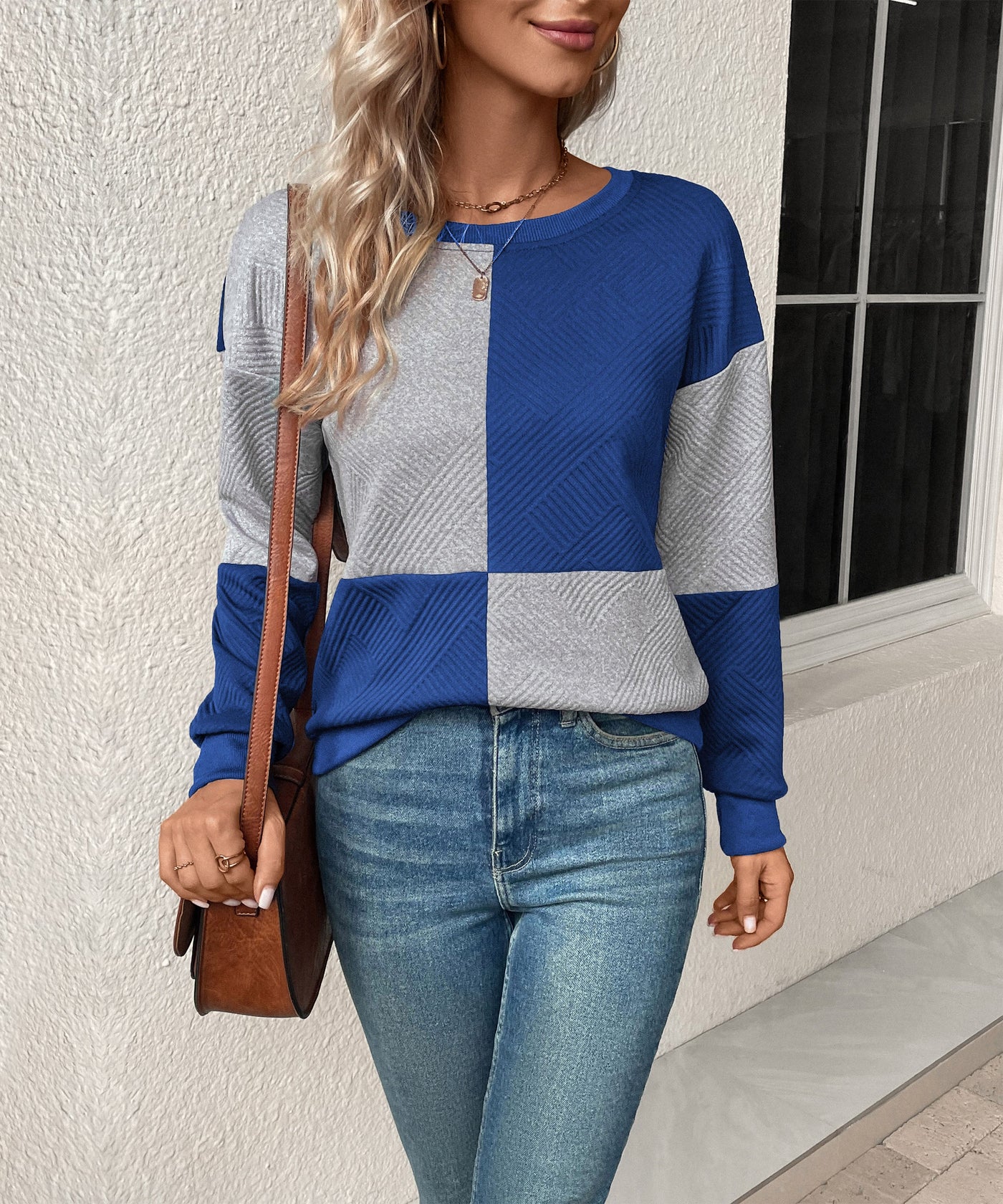 Sudadera texturizada con bloques de color para mujer