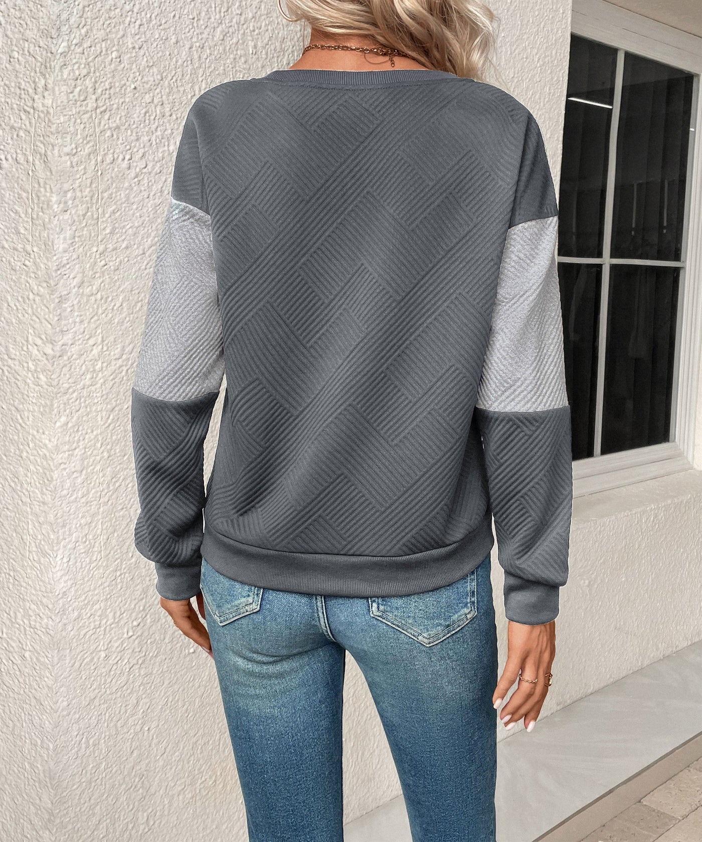 Sudadera texturizada con bloques de color para mujer